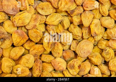 Texture de fond des abricots secs. Vue de dessus. Gros plan. Banque D'Images