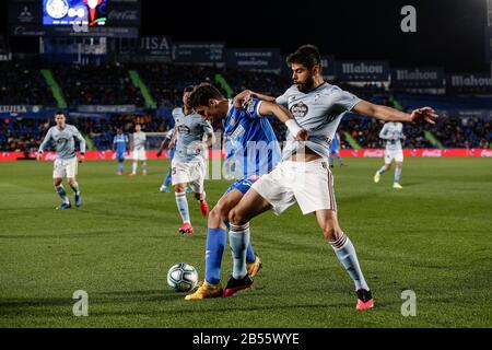 Colisée Alfonso Perez, Madrid, Espagne. 7 mars 2020. La Liga Football, Club Getafe Club De Futbol Contre Celta Vigo; Jaime Mata (Getafe Cf) Détient Le Crédit Okay Yokuslu (Celta De Vigo): Action Plus Sports/Alay Live News Banque D'Images