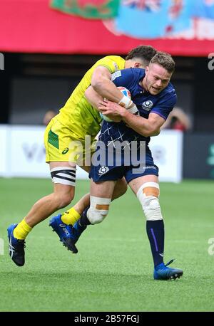 Vancouver, Canada. 7 mars 2020. Gavin Lowe #10 d'Écosse par des joueurs de l'Australie au match no 2 au cours du premier jour - 2020 série HSBC World Rugby Sevens à la BC Place de Vancouver, Canada. Crédit: Joe Ng/Alay Live News Banque D'Images