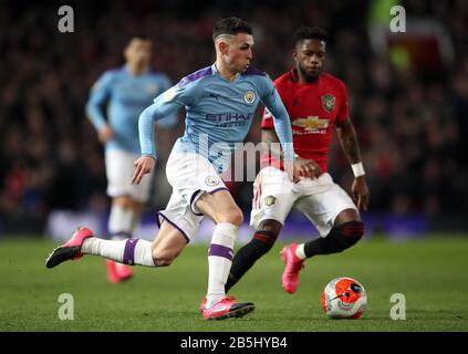 Phil Foden de Manchester City (à gauche) et Fred de Manchester United lors du match de la Premier League à Old Trafford, Manchester. Banque D'Images