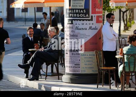 8 mars 2020: 8 mars 2020 (Malaga) le tournage du film opération Mincemat' à Malaga, en photos. L'environnement du Paseo del Parque est devenu ce dimanche le cadre pour la prise de vue de l'opération Mincemat, Le film de John Madden avec Colin Firth et Rachel Weisz sur une véritable histoire de espions qui ont influencé le résultat de la seconde Guerre mondiale et dans laquelle le gouvernement Franco a été impliqué.Sans la présence des protagonistes, L'ensemble a été rempli de suppléments caractérisés en consonance 1943 alors que l'hôtel de ville est resté le siège du même gouvernement francoiste, avec le prec Banque D'Images