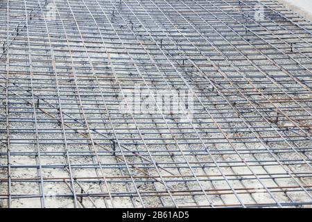 Arrière-plan des barres d'acier de renfort pour l'armature de bâtiment. Renforcement en acier dans la construction du bâtiment. Banque D'Images