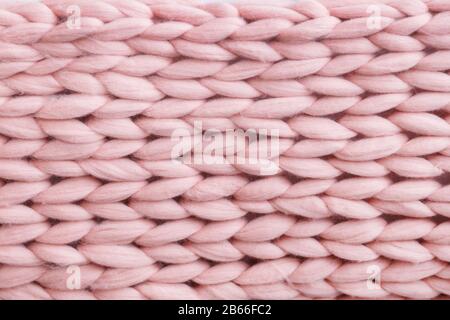 Texture tricotée en laine mérinos rose Banque D'Images