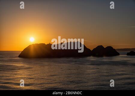 Lever du soleil à l'entrée du port de Muscat en Oman Banque D'Images