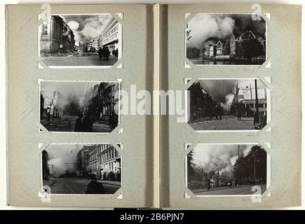 Gezicht op de Meent te Rotterdam met rookwolken Cette photo fait partie d'un album. Fabricant : Photographe: J. NoltePlaats fabrication: Rotterdam Date: Le ou après le 14 mai 1940 Caractéristiques physiques: Gélatine argent imprimé matériel: Papier technique: Gélatine argent imprimé dimensions: Photo: H 88 mm × W 140 mm Objet: Au feu, ablazestreetdévasté, ruiné place ou ville ( guerre) Bombardement de Rotterdam Où: Rotterdam Banque D'Images