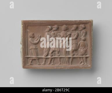 Haardsteen a rencontré voorstelling van de ter dood veroordeelde Suzanna, la porte de mort Daniël tegemoet wordt getreden. Rechts draagt een jongen een mand met stenen aan. Fabricant : vervaardiger: AnoniemPlaats fabrication: Nederland Dating: CA. 1875 - env. 1900 kenmerken physique: Aardewerk matériel: Aardewerk Techniek: Bakken / stempelen Dimensions: H 10 cm. × b 14,5 cm. × d 1,2 cm. Banque D'Images