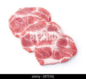 Vue de dessus de trois steaks de viande de porc frais crus isolés sur blanc Banque D'Images