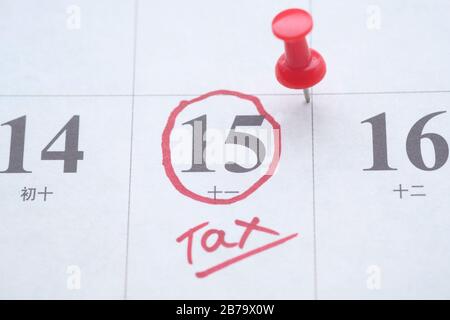 Concept de jour d'imposition. La date d'échéance de taxe aux États-Unis indiquée sur le calendrier Banque D'Images