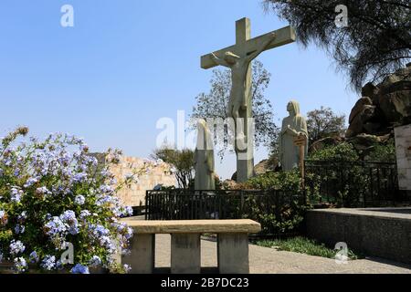 Statue de Jésus sur la croix, terrasse Bellavista, Cerro San Cristóbal, Santiago City, Chili. Banque D'Images