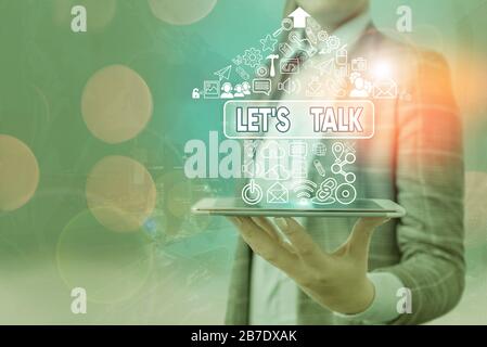 L'écriture conceptuelle de la main montrant les lets est Talk. Concept signifiant suggérant au début d'une conversation sur le sujet Banque D'Images