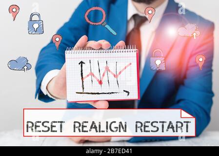 Écrit remarque montrant Réinitialiser réaligner redémarrer. Concept d'affaires pour la vie l'audit va vous aider à mettre les choses en perspectives Banque D'Images