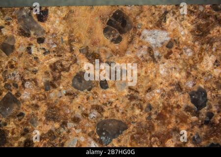 pierre porphyre polie sous la loupe Banque D'Images