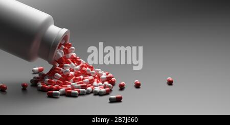 Capsules médicaments pilules, concept de pharmacie de santé. Médicaments pour les médicaments de traitement. Capsules de couleur blanche rouge dispersées à partir d'une bouteille sur fond gris Banque D'Images