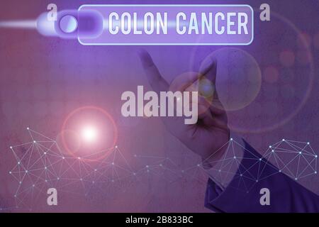 Écriture conceptuelle de la main montrant le cancer du côlon. Concept signifiant le développement de cellules cancéreuses à partir du côlon ou du rectum Banque D'Images