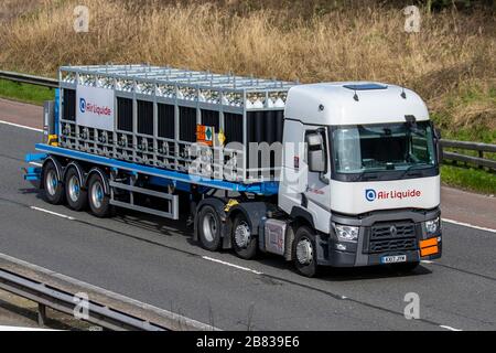 Gaz en bouteille Air liquide, camions de livraison de transport, camion, transport, camion, transporteur de fret, véhicule Renault, transport commercial européen, industrie, M61 à Manchester, Royaume-Uni Banque D'Images