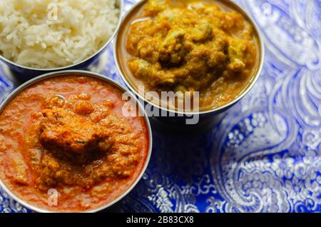 Poulet doux Korma et poulet Tikka Masala avec riz Basmati, cuisine indienne Banque D'Images