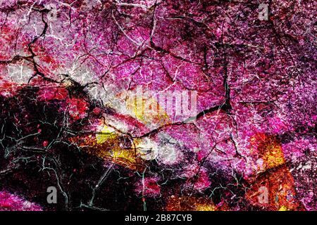 Texture de surface avec beaucoup de couleurs avec une structure de surface solide poreuse et fissurée. Pour les arrière-plans abstraits. Allemagne Banque D'Images