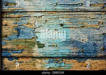 La texture des anciennes planches en bois avec de la peinture écaillée peut être utilisée comme arrière-plan Banque D'Images