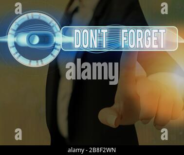 Écriture conceptuelle de la main montrant ne pas oublier. Signification du concept utilisée pour rappeler à quelqu'un des faits ou des détails importants Banque D'Images