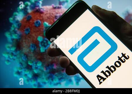 Dans cette photo, le logo Abbott, de la société américaine de soins médicaux et de santé, est affiché sur un smartphone avec un modèle d'ordinateur du coronavirus COVID-19 en arrière-plan. Banque D'Images