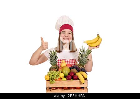 hapy femelle cuisinier avec banane et pouce vers le haut Banque D'Images