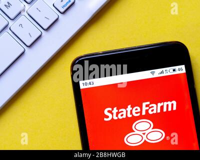 Dans cette illustration photo, le logo State Farm s'affiche sur un smartphone Banque D'Images