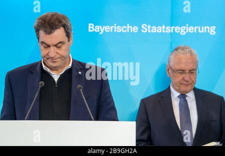 24 mars 2020, la Bavière, Munich: Markus Söder (l, CSU), Premier ministre de la Bavière, et Joachim Herrmann (CSU), ministre de l'intérieur de la Bavière, prendront part à une conférence de presse qui, pour des raisons de sécurité, ne sera transmise que par direct. Photo: Peter Knepoel/dpa Banque D'Images