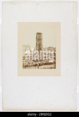 Colonne d'élévation DE LA VICTOIRE, APPELÉE FONTAINE PALM PLACE DU CHATELET, 1ère arrondissement, PARIS, 21 avril 1858 Exhaussement de la Colonne de la Victoire, dite fontaine du Palmier, place du Châtelet. Paris (Ier arr.), 21 avril 1858. Photo de Charles Marville (1813-1879). Paris, musée Carnavalet. Banque D'Images