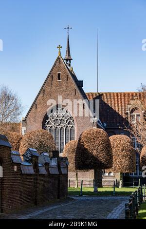 Gent, Belgique - 22 mars 2020: Le béguinage Saint Elisabeth ou Groot Begijnhof. Patrimoine mondial de l'UNESCO Banque D'Images