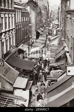 Berwick Street Market, Soho, Londres, Angleterre. De l'Esprit de Londres, publié 1935 Banque D'Images