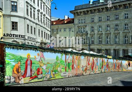 Vienne, Autriche - 27 mars 2016 : peinture murale religieuse sur le marché traditionnel de Pâques sur la place Freyung Banque D'Images