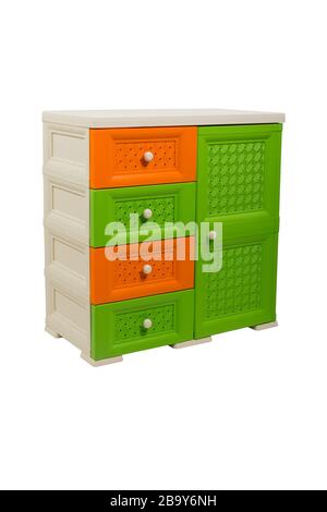 Commode sur fond blanc isolé, plastique, trois couleurs, beige-orange-vert, lumière studio Banque D'Images