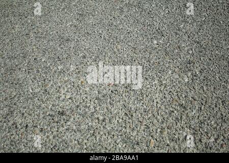 texture de la route - petite surface de pierres grises Banque D'Images