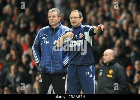 Martin O'Neill, responsable de Sunderland (à droite), et Steve Walford, premier entraîneur d'équipe sur l'écran tactile Banque D'Images