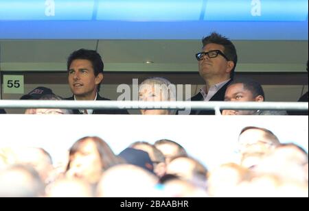 Acteur Tom Cruise et réalisateur Christopher McQuarrie (r) dans les stands Banque D'Images