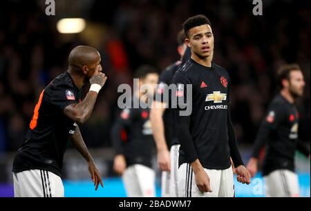 Ashley Young (à gauche) de Manchester United parle avec Mason Greenwood Banque D'Images