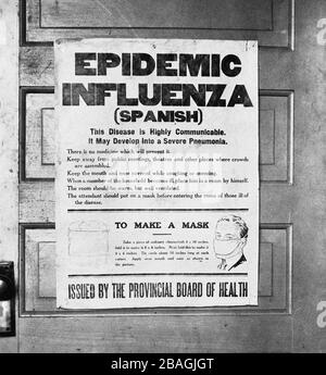 Affiche de la grippe espagnole. Affiche publiée par la Commission provinciale de la santé de l'Alberta, qui alerte le public à l'épidémie de grippe de 1918. L'affiche donne des informations sur la grippe espagnole et des instructions sur la façon de faire un masque. Banque D'Images