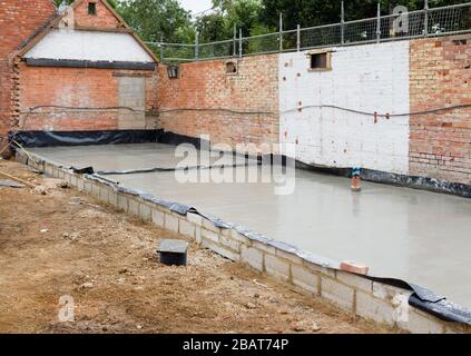 De nouvelles fondations dans le cadre de la reconstruction d'une maison d'époque au Royaume-Uni Banque D'Images