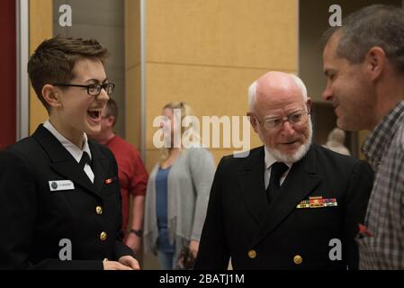 Chief Hospital Corpsman, United States Fleet Marine Forces, Jessica Zugzda  steams a dress Navy uniform in the uniform shop of the Air Force Mortuary  Affairs Operations center at Dover Air Force Base