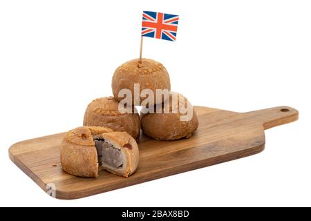 Petites tartes de porc avec drapeau britannique Union Jack - fond blanc Banque D'Images