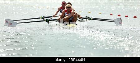 Andrew Trigs Hodge (devant) de Grande-Bretagne avec Tom James, Pete Reed et Alex Gregory en action dans leur chaleur des quatre hommes à Eton Dorney. Banque D'Images