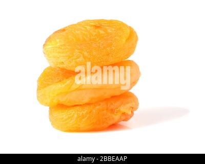 Trois abricots secs sur le fond Banque D'Images