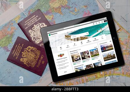 Site Web de voyage de TripAdvisor sur un iPad ou une tablette. (usage éditorial uniquement) Banque D'Images