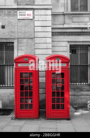 Coronavirus ou Covid 19 Illustration sur les boîtes téléphoniques rouges britanniques, Londres, Angleterre, Royaume-Uni Banque D'Images