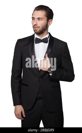 Requin du capitalisme. Jeune homme d'affaires montrant. Il est vêtu d'un costume noir strict. Riche. Banque D'Images