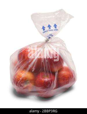 Petit sac d'pommes en plastique isolé sur blanc. Banque D'Images