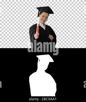 Femme de graduation souriant et regardant heureux, Alpha Channel Banque D'Images