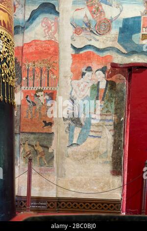 Wat Phumin a quelques-uns des plus uniques peintures murales en Thaïlande. Peintures bien conservées qui représentent les légendes bouddhistes et la vie quotidienne des gens de Tai Lue Banque D'Images