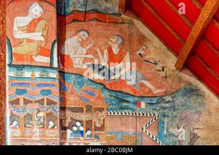 Wat Phumin a quelques-uns des plus uniques peintures murales en Thaïlande. Peintures bien conservées qui représentent les légendes bouddhistes et la vie quotidienne des gens de Tai Lue Banque D'Images