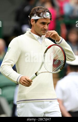 Roger Federer, Suisse, se réchauffe pour le match contre Xavier Malisse, Belgique Banque D'Images